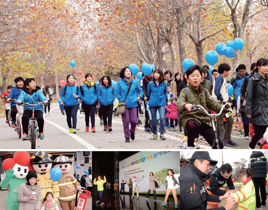 ▲ 1. 11월 8일 고양 호수공원에서 열린 ‘제2회 고양 아이사랑 가족걷기대회’에서 시민들이 가족들과 함께 노란잎으로 물든 호수공원길을 걸으며 가을의 정취를 만끽하고 있다2.‘제2회 고양 아이사랑 걷기대회’에서는 부대행사로 안전사고 예방과 응급처지 요령 등의 교육도 함께 이뤄졌다. 119소방과 사랑의 열매 마스코트가 어린이와 함께 기념촬영을 하고 있다3. 최봉순 고양부시장, 선재길 고양시의장을 비롯한 이순국 경기일보 사장 등 내빈들이 안전사고 예방을 위해 출발에 앞서 준비운동을 하고 있다4. 한 아이가 119소방 대원의 도움을 받아 구급복을 입어보며 소방대원 체험을 하고 있다