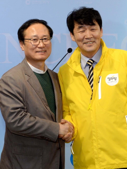 크기변환_1면 20160323 더불어민주당 정의당 인천시당 야권 단일화 기자회견JYJ_7713.jpg
