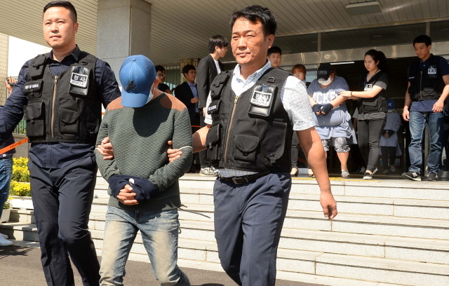 크기변환_7면 20161004 포천 입양아 학대치사 양부모 영장 실질심사 JUN_1358.jpg