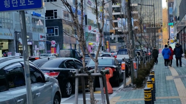 ▲ 주차장이 돼버린 민락 2지구 상업지역 오목로