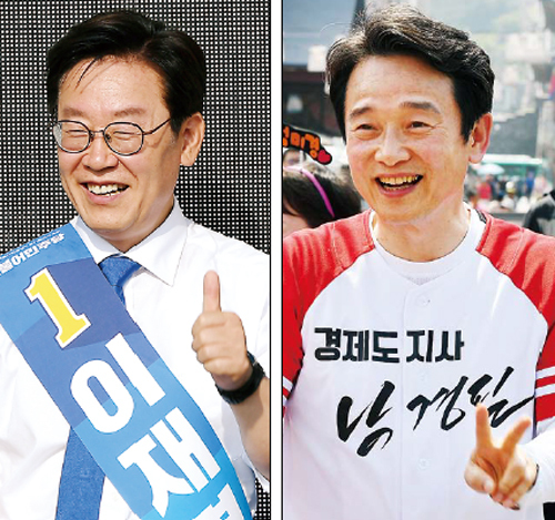 6·13 전국동시지방선거 공식 선거운동 첫 날인 31일 경기도지사 후보 더불어민주당 이재명(왼쪽)과 자유한국당 남경필이 각각 손으로 기호를 표시하며 지지를 호소하고 있다. 조태형기자