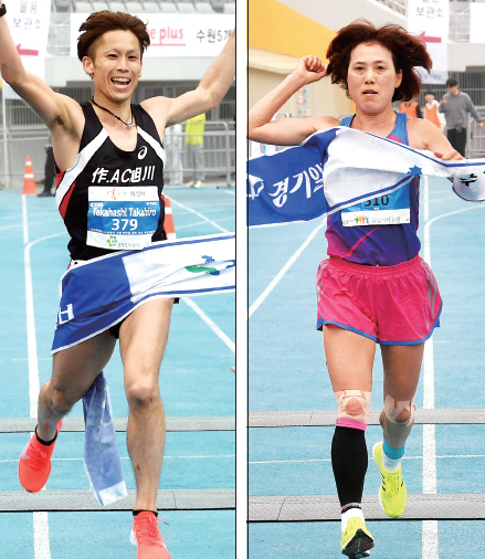 ‘제17회 경기마라톤대회’가 열린 21일 수원종합운동장에서 남녀 풀코스 우승을 차지한 다카하시 다카히로씨(왼쪽)와 이정숙씨가 결승선을 통과하고 있다. 특별취재반