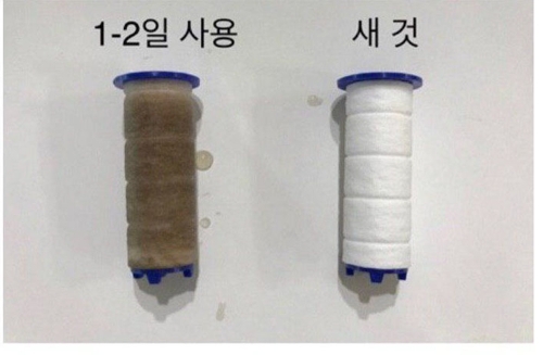 양평군 양평읍 한 아파트단지 가정집의 수돗물 필터가 변색돼 있다. 연합뉴스(독자제공)