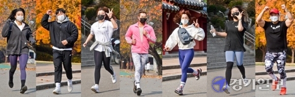 제18회 경기마라톤 언택트레이스 1일차가 열린 13일 오후 수원시 팔달산코스에서 대회 참가자들이 힘차게 달리고 있다. 이번 대회는 코로나19로 13일부터 15일까지 안내코스 포함 전국 자유코스로 참여하는 대회이다. 윤원규 기자