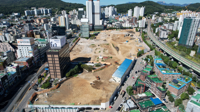 구리지역 부동산시장이 꿈틀거리고 있다. 사진은 롯데캐슬 아파트가 들어설 예정인 인창C구역 전경. 구리시 제공