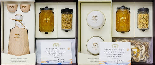 차례용 백일주(공주)를 비롯해 유자청(고흥), 잣(가평), 소고기 육포(횡성) 등이 담긴 설 명절 선물(왼쪽). 불교계 등을 위해 아카시아꿀(논산), 유자청, 잣, 표고채(양양)도 별도로 마련됐다. 대통령실 제공